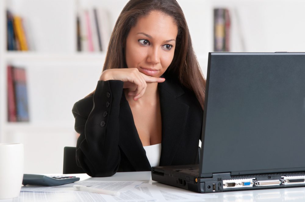 Businesswoman At Office Desk