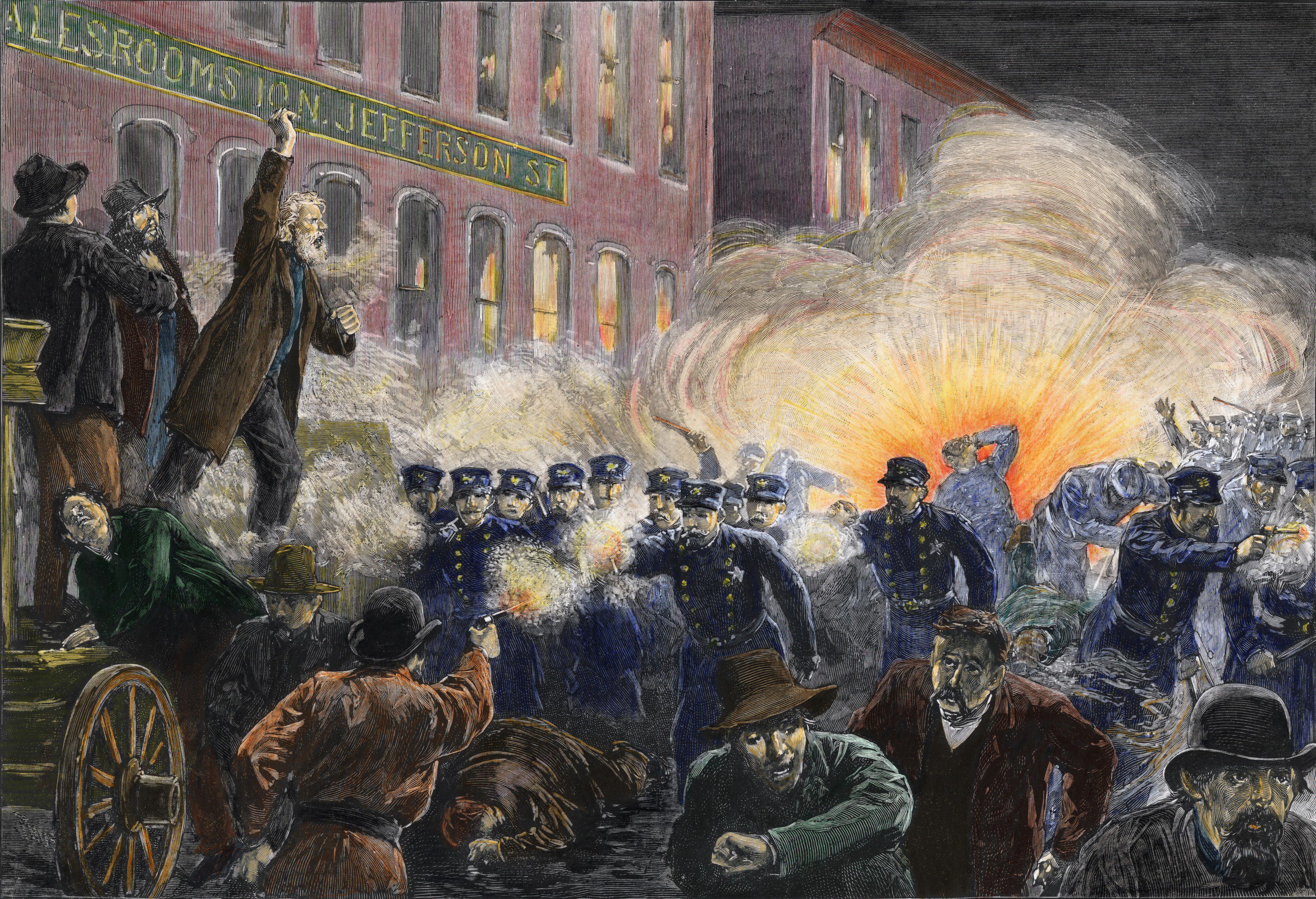 Colorized engraving shows a composit scene from the Haymarket Riot, where an initially peaceful labor protester devolved into a full-scale riot following the detonation of a bomb thrown by protestors (seen in the background) and the police response of indiscriminate firing into the largely unarmed (despite this picture's contrary view) crowd, Chicago, Illinois, May 4, 1886. (Photo by Stock Montage/Getty Images)